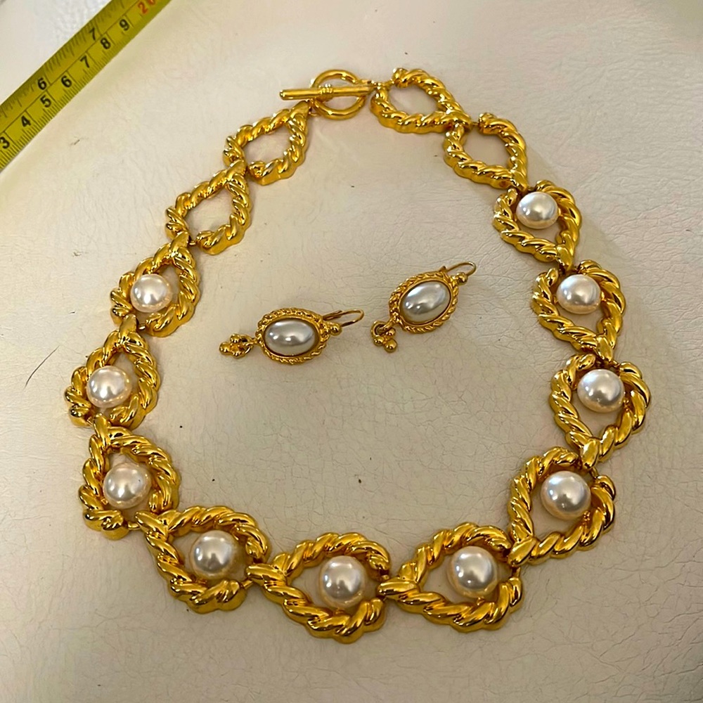 Vintage necklace with Aaron is the front door